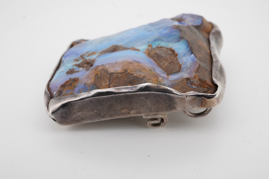 A 925 mounted rough cut opal pendant brooch, 52mm by 47mm. Condition - fair